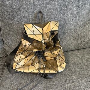 Chic Gold and Black Geometric Backpack